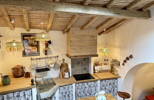 Terras de Bouro Cottage | Lakeside cottage with fireplace, views and terraced gardens
