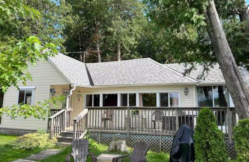Lakefield Ski Chalet | Lakeside Cottage for 8 with Boat Firepit and BBQ