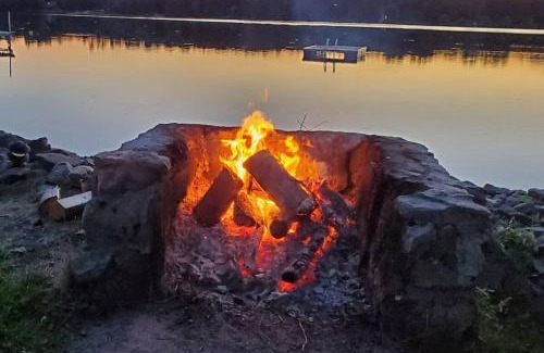 Lakefield Ski Chalet | Lakeside Cottage for 8 with Boat Firepit and BBQ