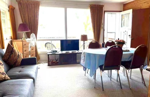 Lakefield Ski Chalet | Lakeside Cottage with Boat BBQ Firepit Swimming Pet Friendly for 6 Family Escape