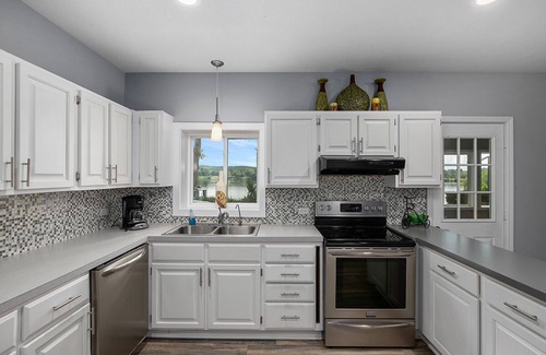 Newaygo Cottage | Lakeside Getaway: Dock, Kayaks, Firepit, Grill