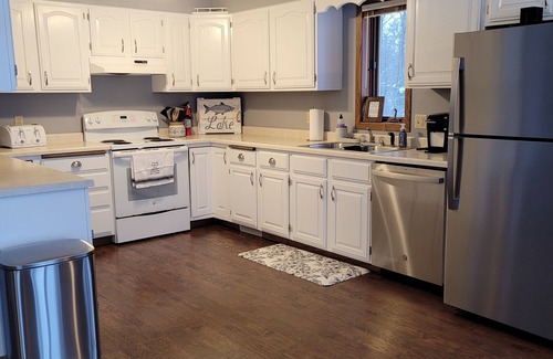 Luck Cabin | Lakeside home with plenty of amenities for all, on river fed Lake!