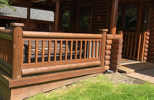 Morpeth Cabin | Lakeside Log Cabin with hot tub overlooking the water.