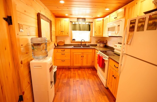 Ellsworth Cabin | Lakeside Pine Cone Cabin 30' private beach & dock, Fireplace , Kayaks, Canoe