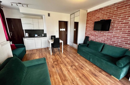 Ostroda Apartment | Lakeside Promenade View Sunset Studio