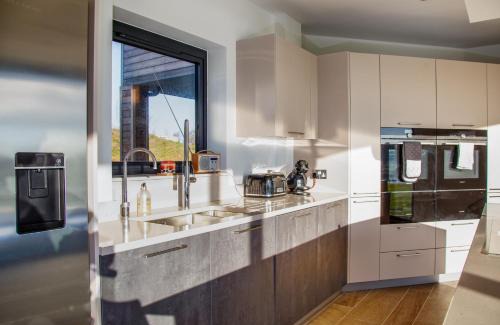 Holworth House | Lakeside property with spa access on a nature reserve Sandpiper BV13