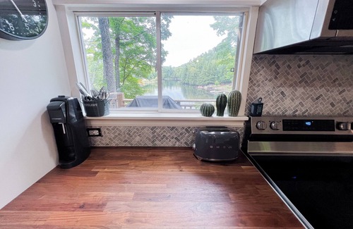 Highlands East Cottage | Lakeside retreat in Highlands East: A 4-season getaway with hot tub