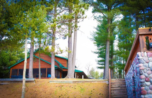 Neillsville Cabin | Lakeside Retreat with Private Docks, Hot Tub, Scenic Views and Near Trails