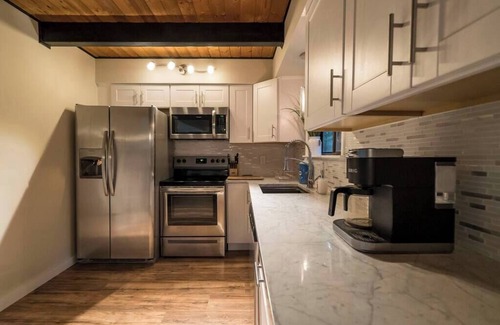 East Stroudsburg House | Lakeview Chalet w/Hot Tub, Sauna, Decks, Boats, & Fire Pit!