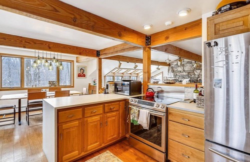 Killington House | Lakewood Lodge: 4BR/2.5BA Killington Home | Private Hot Tub, Wood Fire, Kent Pond & EV Charger