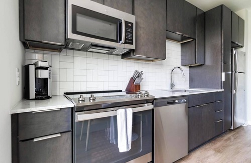 Downtown Apartment | Landing | Chic Studio, Courtyard, Gym