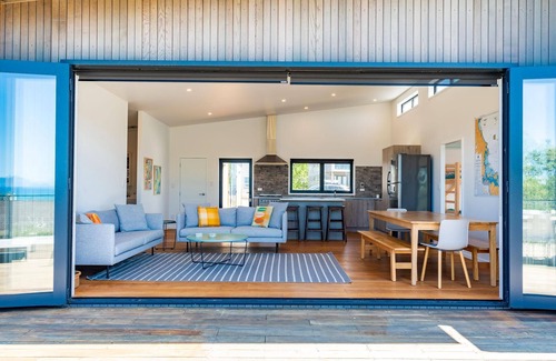 Langs Beach House | Langs Beach House - Modern, sunny holiday home with large decks and stunning views over Bream Bay