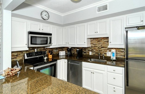 Longboat Key Apartment | LaPlaya 104A- Gulf front! Walk right from your lanai onto the private beach.