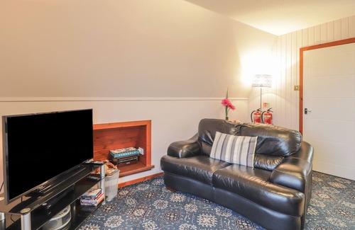 Heights of Achterneed Cabin | LARCHFIELD CHALET 1, pet friendly, with a garden in Strathpeffer