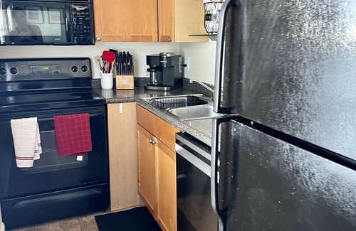 Coquina Key Condo | Large 1 Bedroom w/Large Patio, Kayaks, Pickleball Courts, and on the Bay
