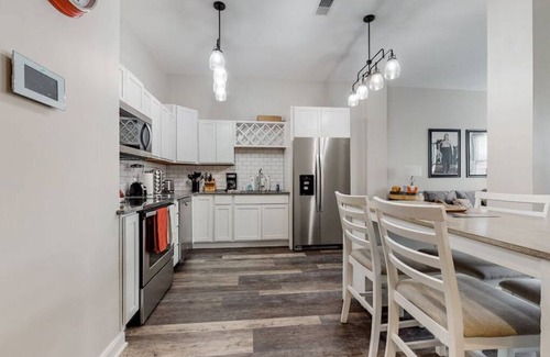 West Main Historic District Condo | Large 2 King BR Condo in Theater District w Free Parking Gym Secure Walkable