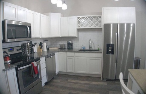 West Main Historic District Condo | Large 2 King BR Condo in Theater District w Free Parking Gym Secure Walkable