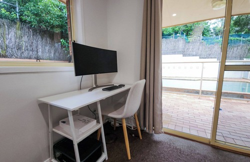 Ryde House | Large and modern 5 Bedroom home with a pool and work areas