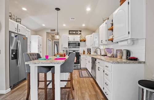 Tulsa House | Large backyard, minutes from Gathering Place