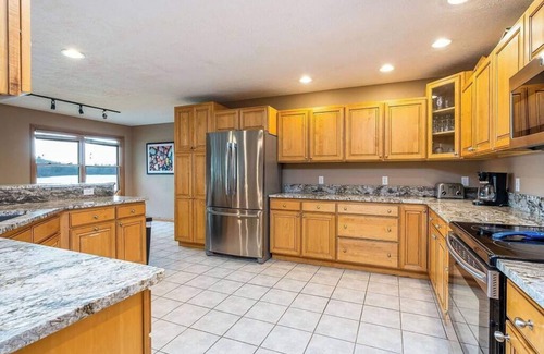 Interlochen House | Large Beach Front Property, 3 Kayaks Include!