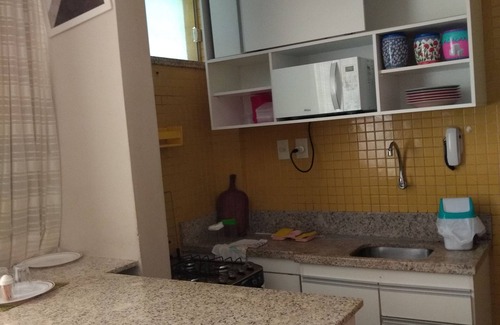 Nazare Apartment | Large bedroom and living room, laundry area, washing machine. He doesn't even know how to climb stairs