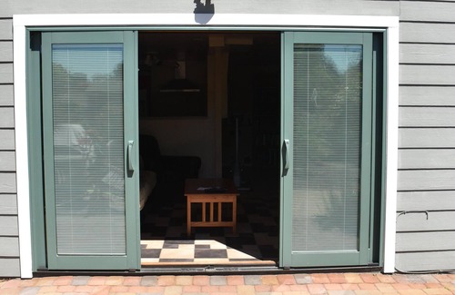 North Berkeley House | Large bedroom, bathroom & tenant kitchen, with lounge area and patio