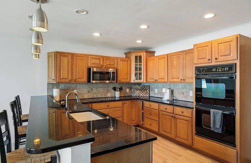 Cheboygan County House | Large Cottage with Sunset Views on Burt Lake!