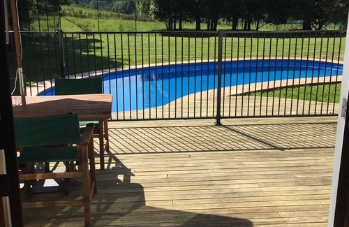 Pouawa House | Large country homestead with tennis court and pool. Only 5 mins from the beach.