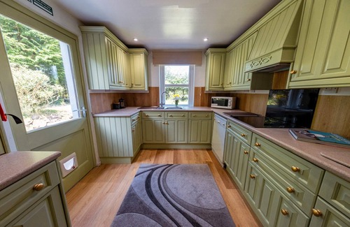 Newton Stewart House | Large country house with garden, outdoor spa area & games room by Get Better Get