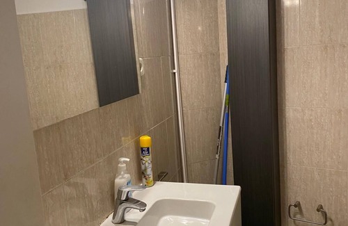Sant Gervasi – la Bonanova Apartment | Large double bedroom with desk, double bed, large wardrobe and window.
