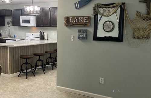 Warsaw Cottage | Large family cottage steps from waters edge.