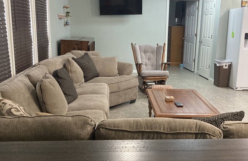 Warsaw Cottage | Large family cottage steps from waters edge.