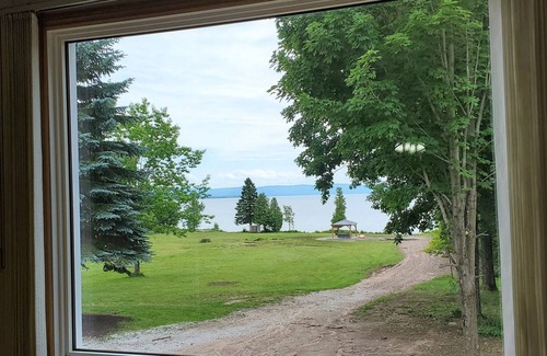 Algoma District Cottage | Large farmhouse style cottage located on three acres of waterfront property.