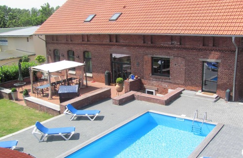 Chausseesiedlung House | Large farmhouse with pool, minutes from the beach