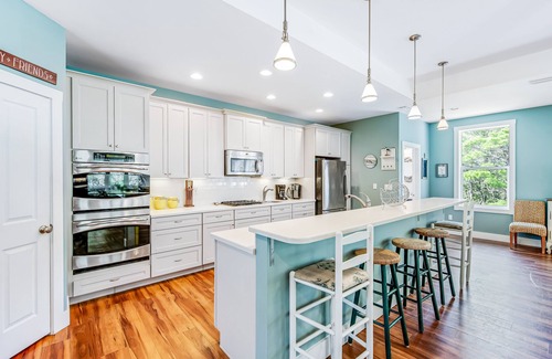 Four Mile Village House | Large Home on Nature Preserve w/ Screened-In Porch & Deck - Private Beach