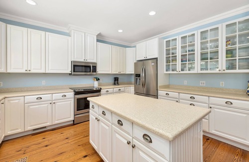 East Beach House | Large Home with Pool, Kids' Play Den and Steps to Beach