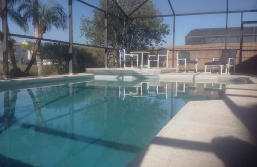 Crescent Lakes Villa | Large Kissimmee Lakeside Villa with South Facing Pool and Spa