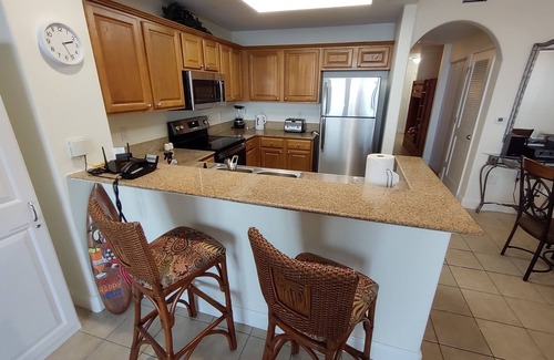 Florida Central Atlantic Coast Condo | LARGE Lakeview Blue Heron CONDO near DISNEY with Balcony & 2 Resort POOLS & SPA