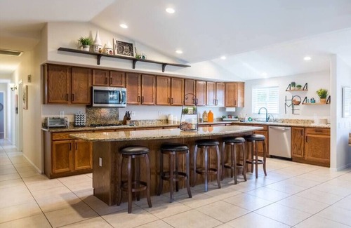 Avondale House | Large oasis, pool heater, spa, putting green