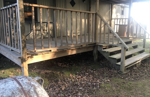 Bastrop House | Large porches overlooking acres of lawn and pasture near lakes and rivers.