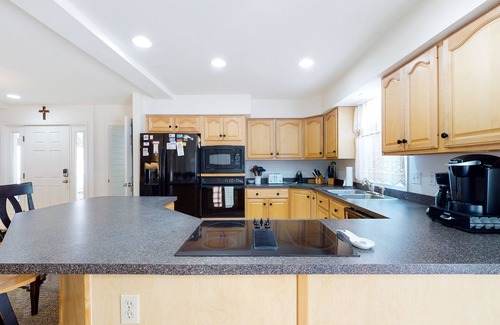 Caine Woods House | Large, Quiet Family Home w/Deck, Porch & WiFi - Walk to the Beach, Shops & More