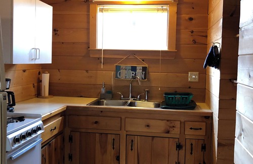 The Forks Cabin | Large Riverside Cabin in The Forks, pet friendly