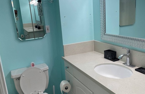 Briarforest House | Large room with attached bathroom in the energy corridor area