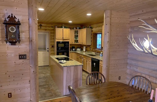 Double Springs House | Large six-bedroom log home w/private boat ramp, dock, movie room and pool room.