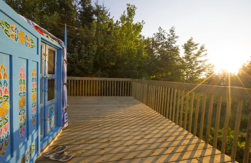 Indian Brook Resort | Large sky blue yurt at Cabot Shores Wilderness Resort