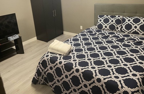 Regina Apartment | Large studio basement suite