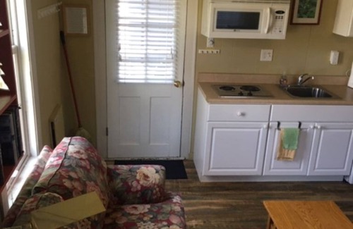Frankfort House | Large studio suite w/private back porch entrance one block from the beach.