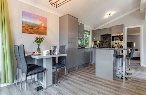 Longnor Ski Chalet | Large superior one-bedroom lodge with hot tub for two adults.