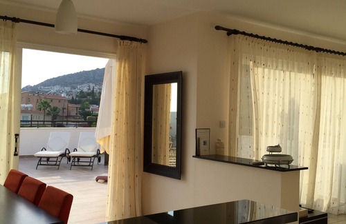 Peyia Town Apartment | Large Terrace, Sea Views, Shared Pool, Free WiFi, UK TV Package, Air Con, Lift