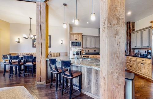 McCall House | Large townhome with outdoor kitchen, open-air fireplace & mountain views